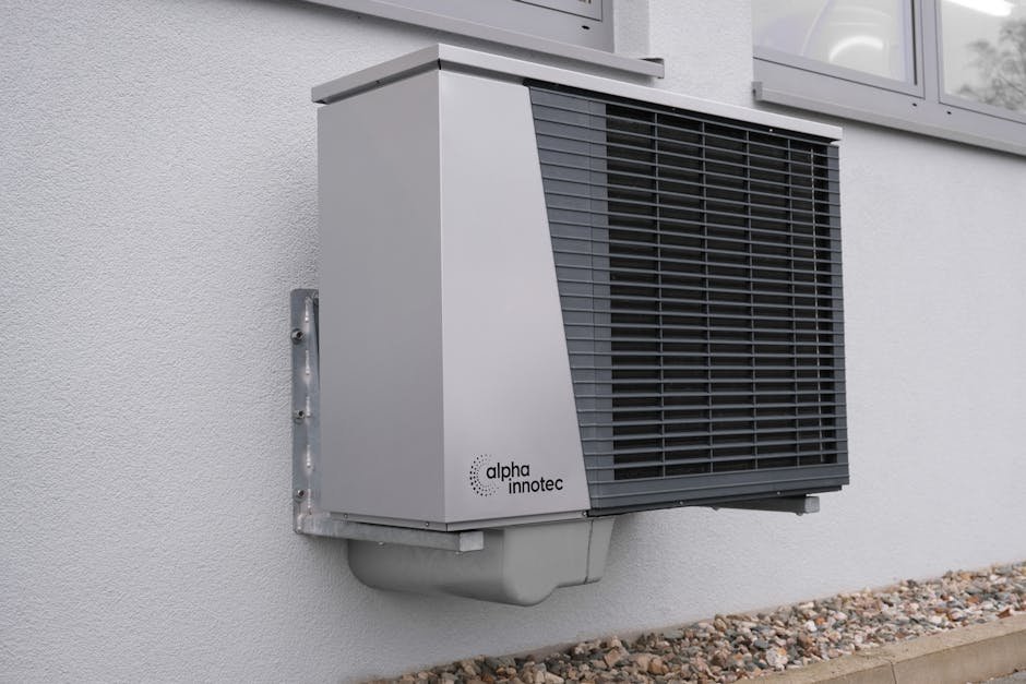 pexels-photo-20046692-20046692 Outdoor air conditioning unit mounted on a residential building exterior.